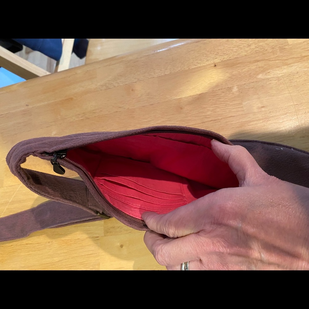 Classic Sash Bag. Worn last fall. Good used condition. Vegan leather.